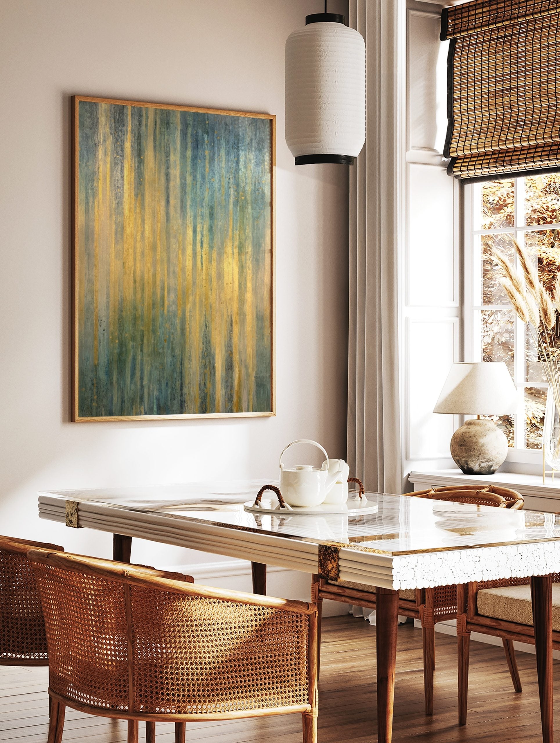 Abstract art print with shimmering vertical gold, teal, and blue stripes, featuring a textured, in a styled room mockup