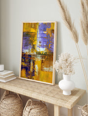 Abstract art print with textured gold, purple, and brown paint strokes in a layered, modern, in an alternate framed mockup