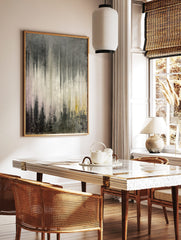 Abstract grey and white wall art with vertical dripped textures and subtle pink and yellow tones, in a styled room mockup