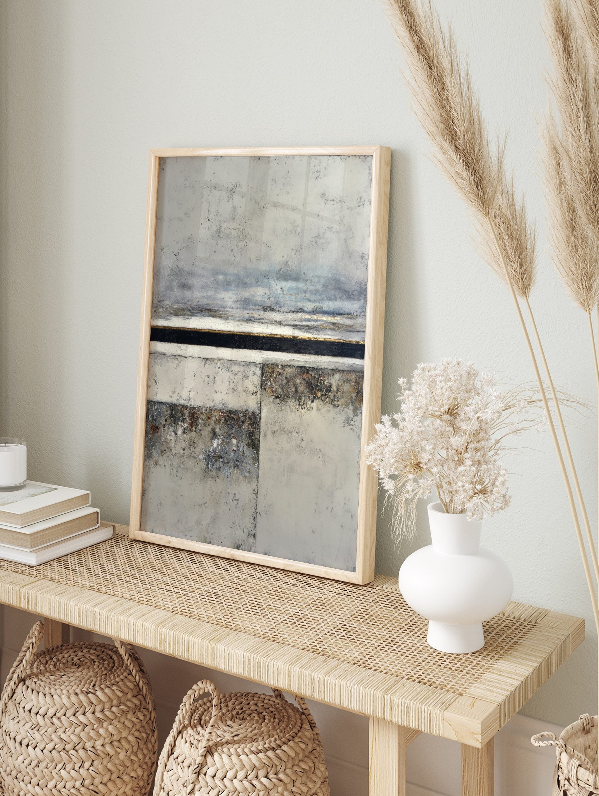 Abstract textured landscape wall art print with grey, off-white, black, and gold horizontal, in an alternate framed mockup