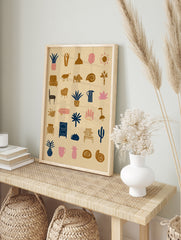Abstract icon grid wall art featuring minimalist plant, furniture, and animal illustrations, in an alternate framed mockup