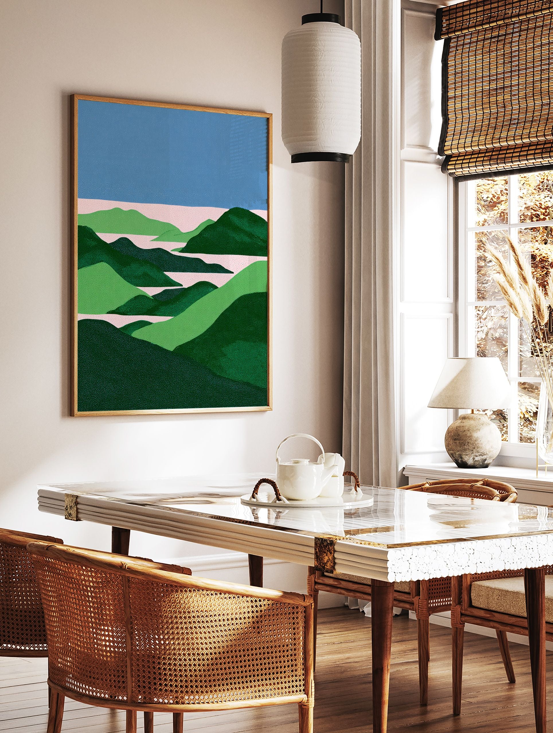 Abstract landscape wall art print with blue sky, pink water, and green rolling hills in a stippled, minimalist style. - Image 2