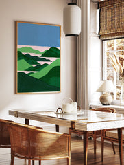 Abstract landscape wall art print with blue sky, pink water, and green rolling hills in a stippled, minimalist style. - Image 2