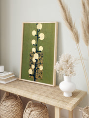 Abstract light tree illustration with glowing circles, dark branches, and ornate gold panel, in an alternate framed mockup