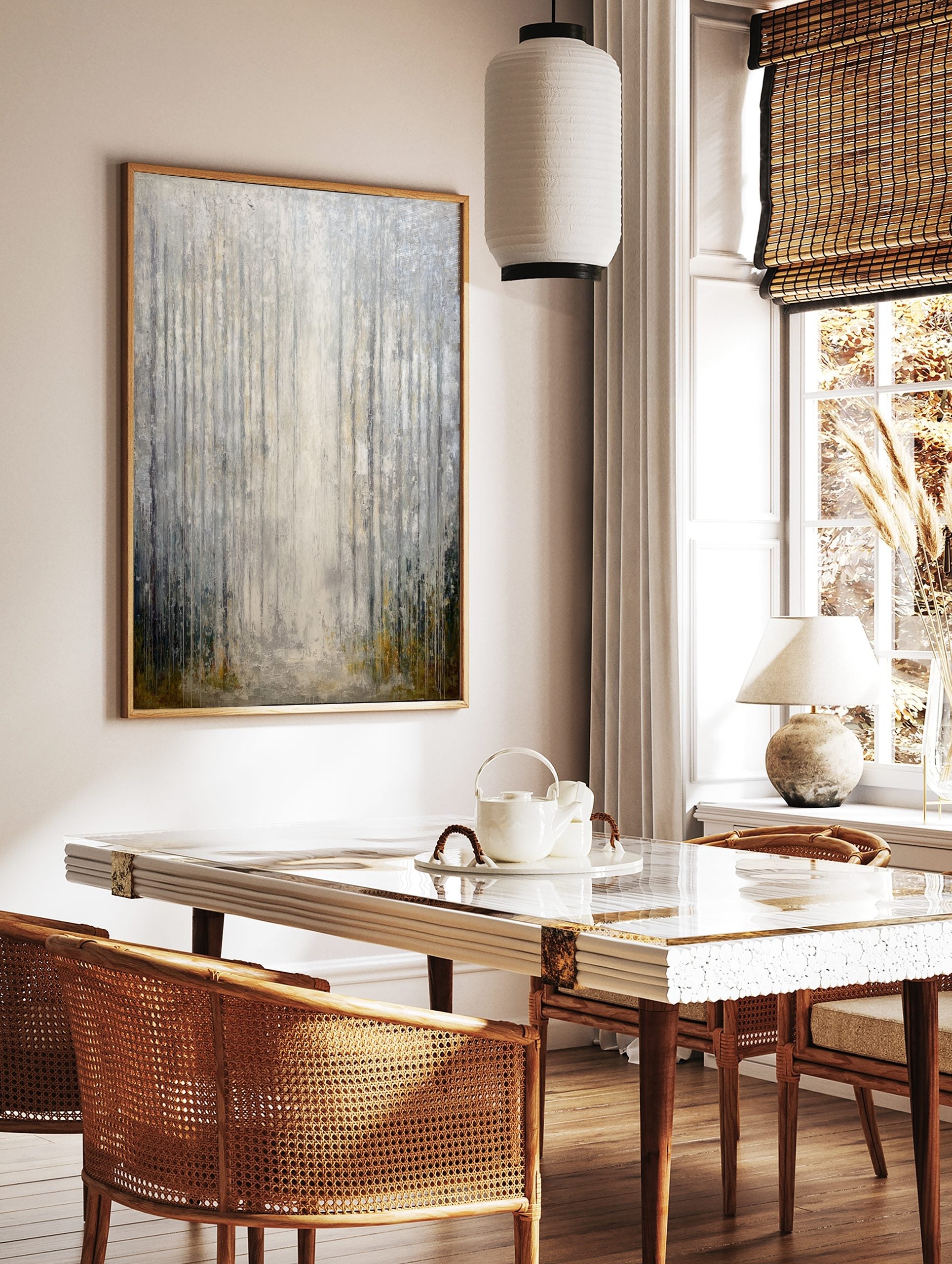 Abstract misty forest art print with vertical grey, silver, and white lines and subtle green and, in a styled room mockup