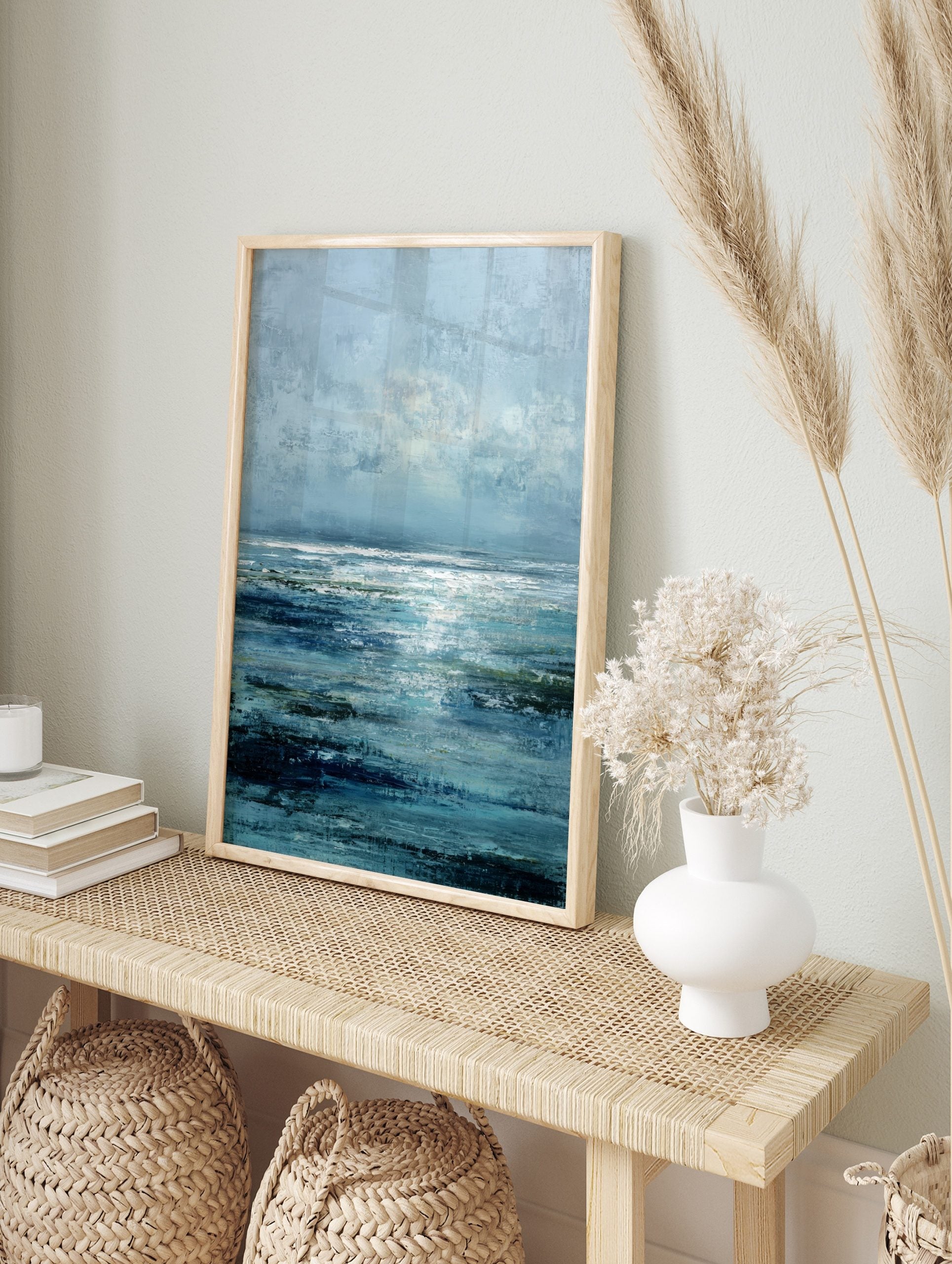 Abstract ocean seascape wall art print with blue textured waves, green accents, and bright, in an alternate framed mockup