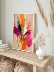 Abstract painting with energetic orange, fuchsia, black, and white brushstrokes and lines on, in an alternate framed mockup