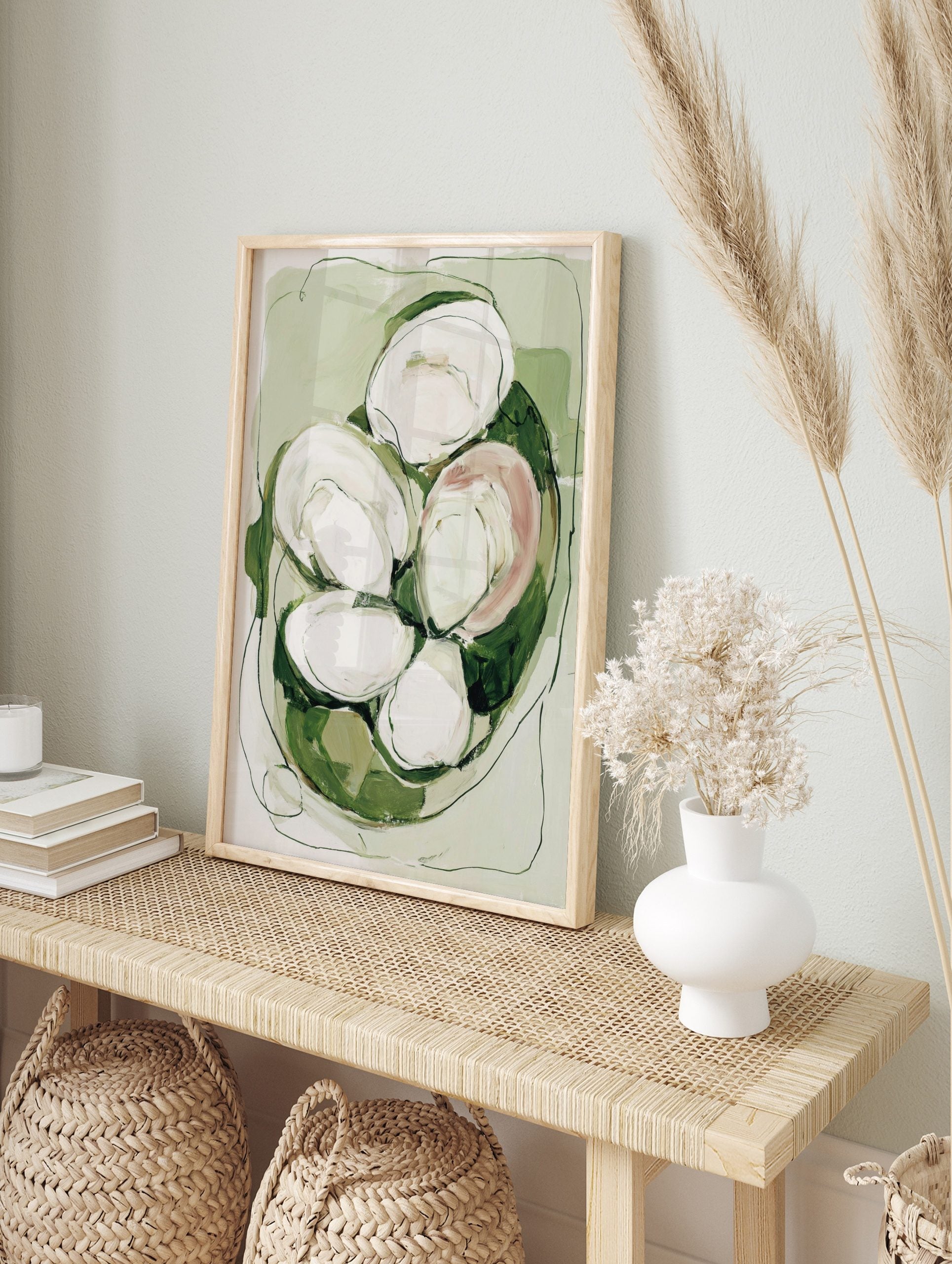 Abstract oyster shell wall art in green, white, and blush with organic shapes and dark, in an alternate framed mockup