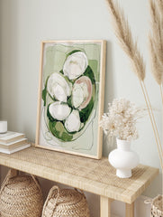 Abstract oyster shell wall art in green, white, and blush with organic shapes and dark, in an alternate framed mockup