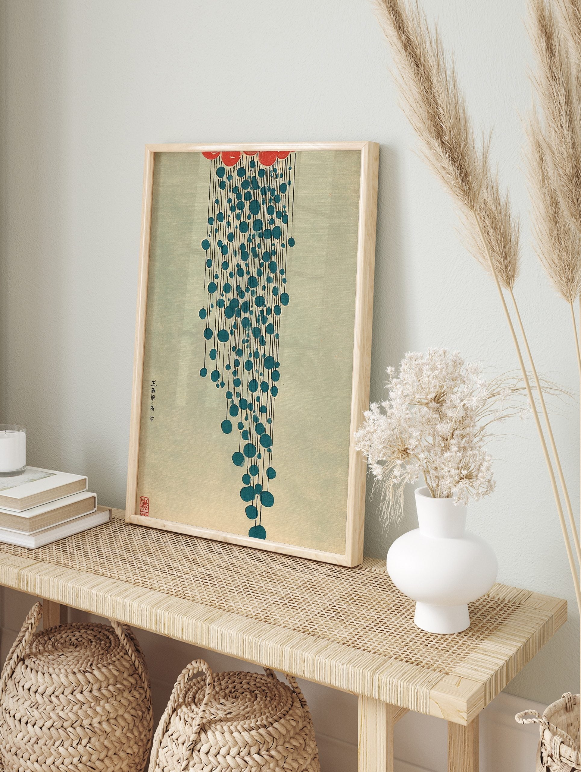 Abstract Japanese art print with red cloud shape, falling blue circles, black lines, and, in an alternate framed mockup