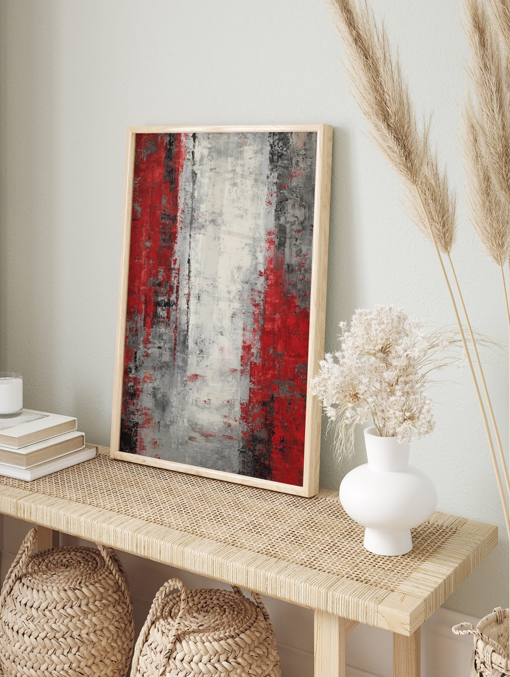 Abstract art print with textured vertical stripes in red, white, grey, and black, portrait, in an alternate framed mockup
