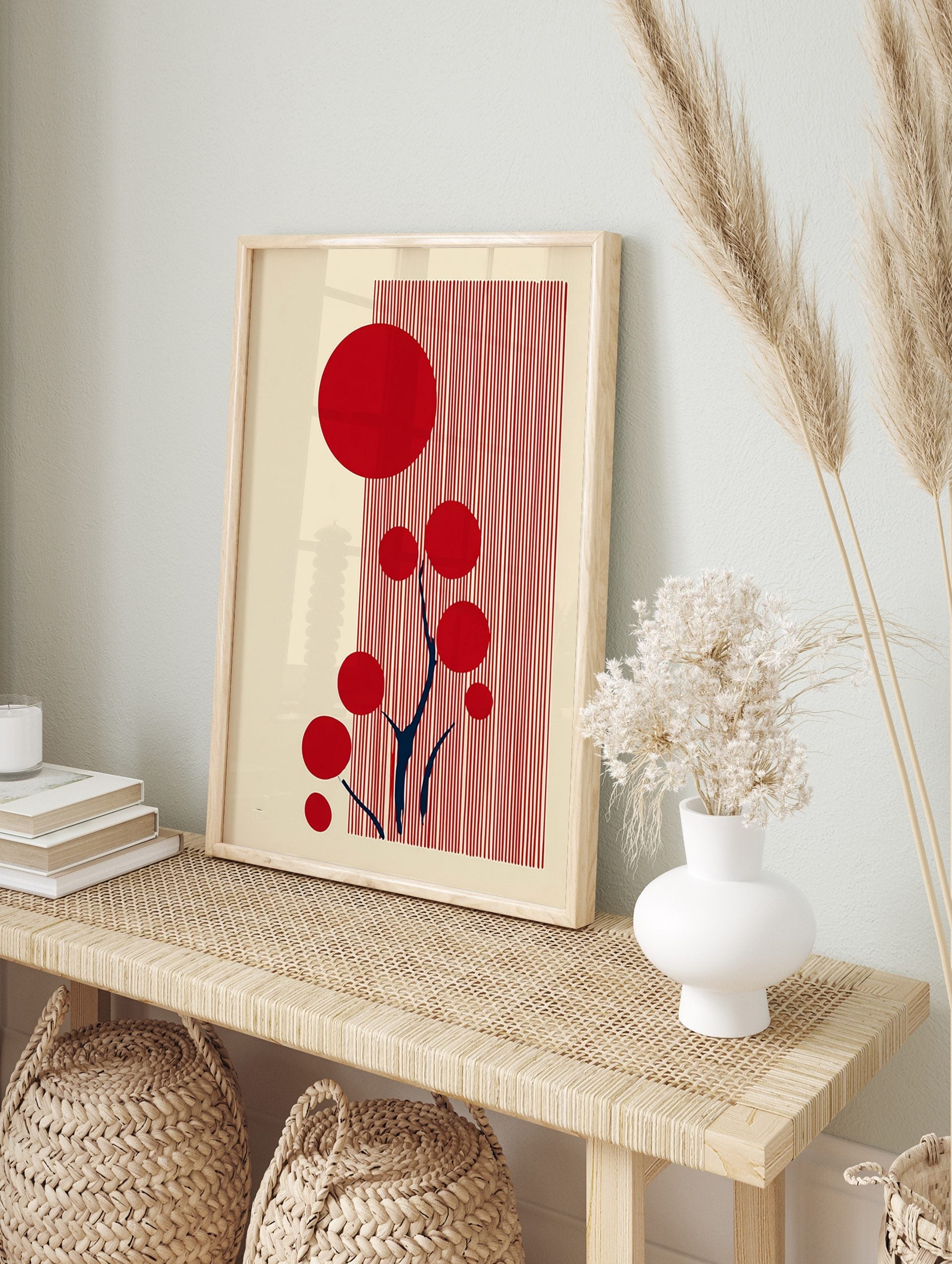 Abstract red circles and dark blue branches on a cream background with vertical red stripes, in an alternate framed mockup