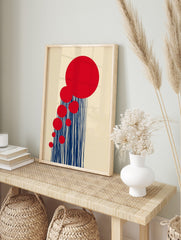 Abstract art print with cascading red circles and vertical navy blue lines on a beige, in an alternate framed mockup