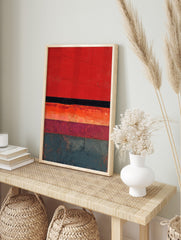 Abstract textured wall art with horizontal stripes in red, black, orange, plum, and teal, in an alternate framed mockup