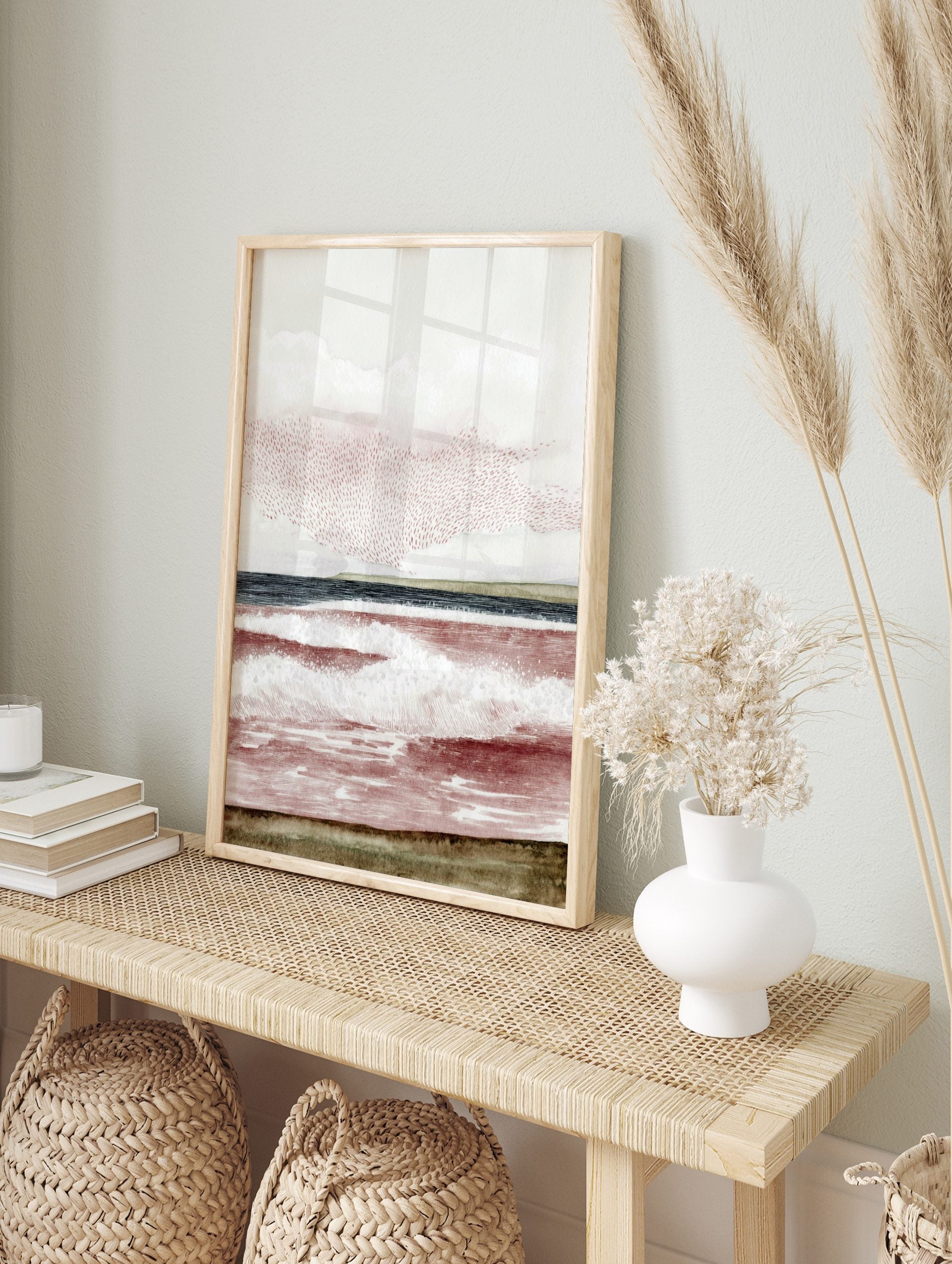 Abstract seascape art print with reddish-brown waves, dark blue ocean, green horizon, and, in an alternate framed mockup