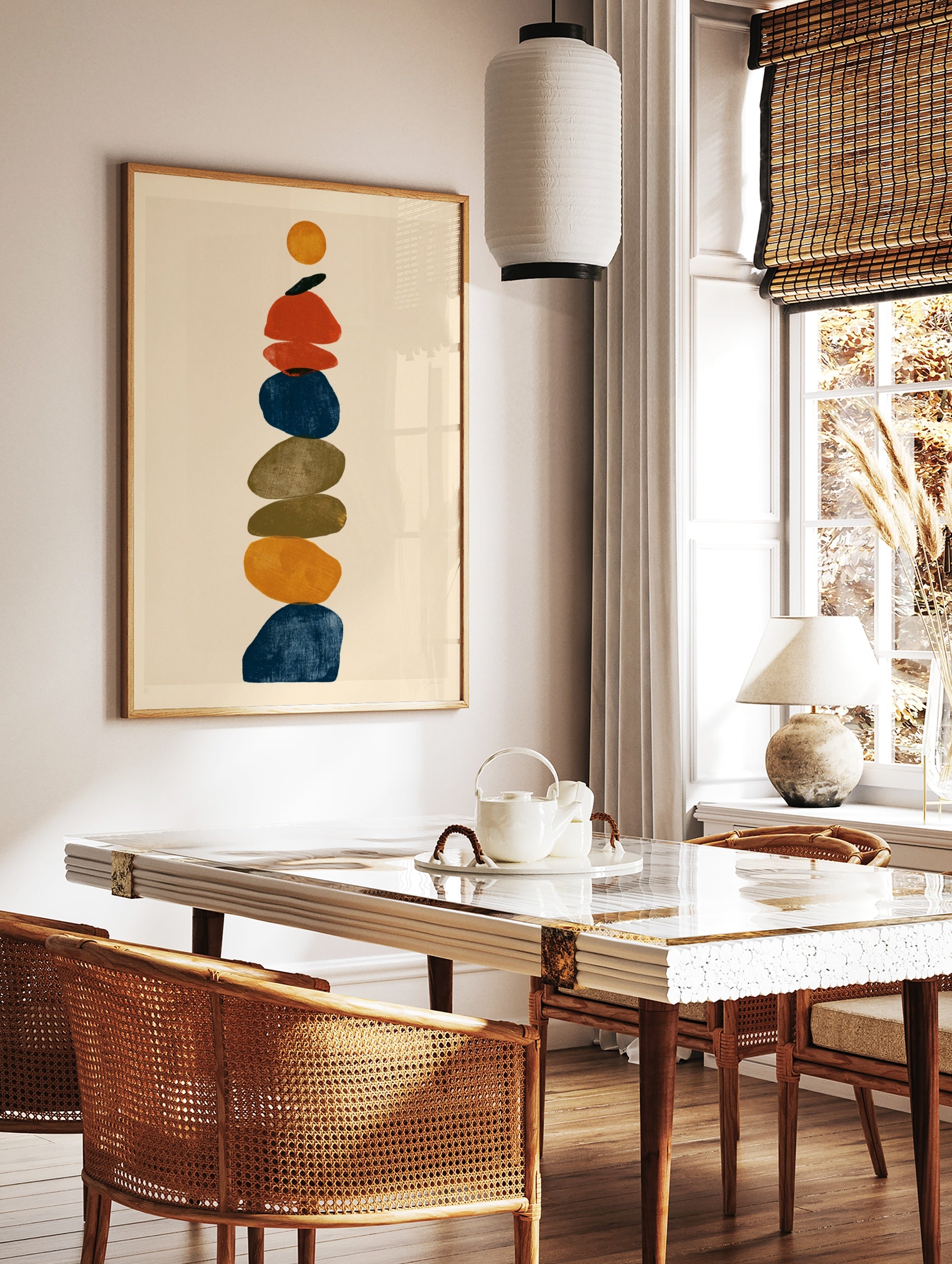 Abstract stone stack wall art print featuring vertical layered rounded shapes in blue, orange, red, in a styled room mockup