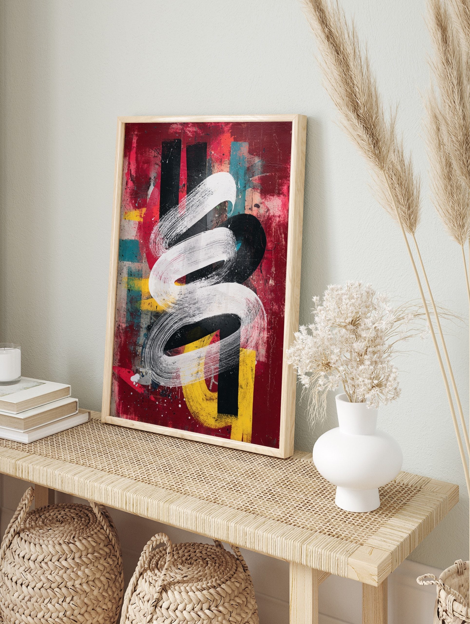 Abstract art print with a swirling white brushstroke over distressed red, black, yellow, and, in an alternate framed mockup