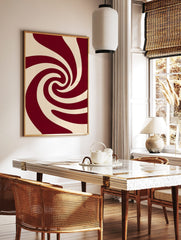 Abstract swirling pattern wall art in deep red and cream, with smooth, curved lines creating a, in a styled room mockup