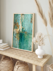 Abstract textured painting with teal, deep green, and gold distressed details, a modern art, in an alternate framed mockup