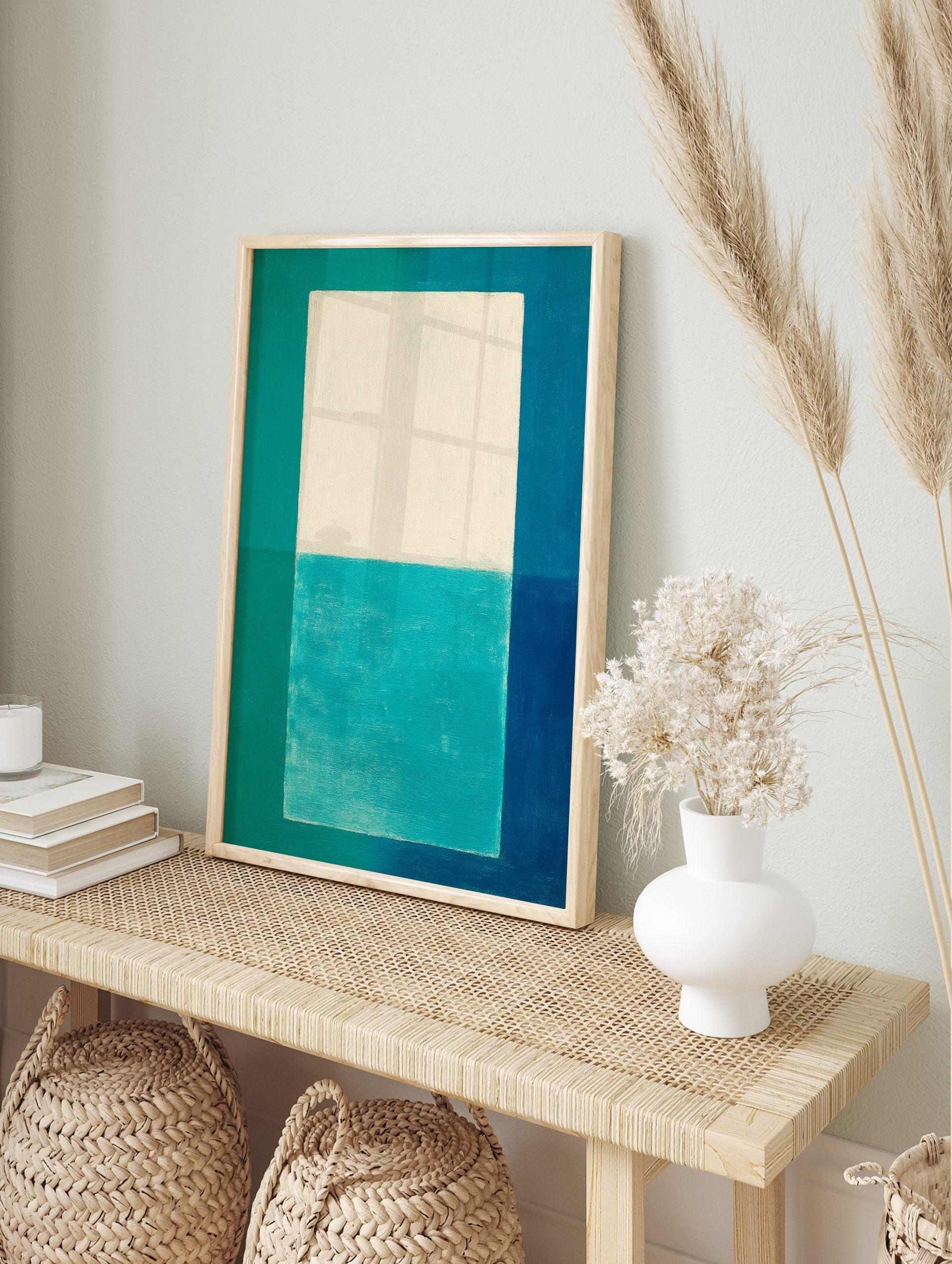 Abstract geometric art print with white and teal central block, framed by teal, turquoise, in an alternate framed mockup