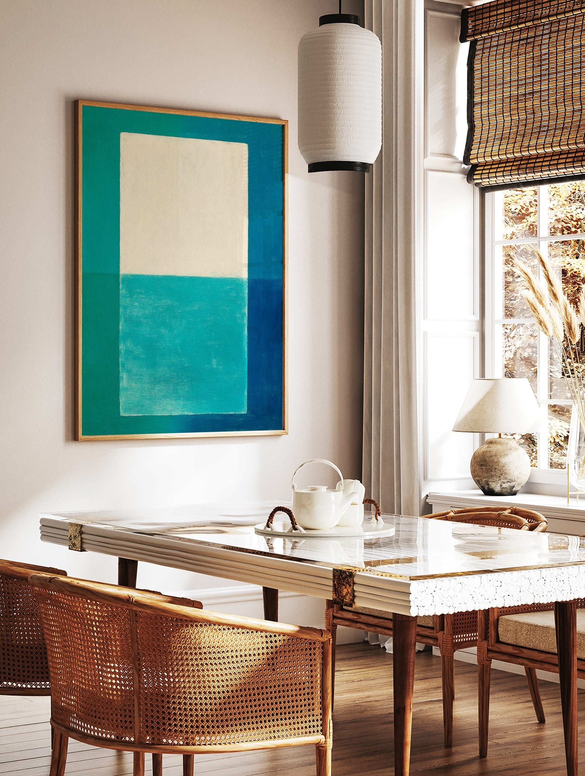 Abstract geometric art print with white and teal central block, framed by teal, turquoise, and blue, in a styled room mockup