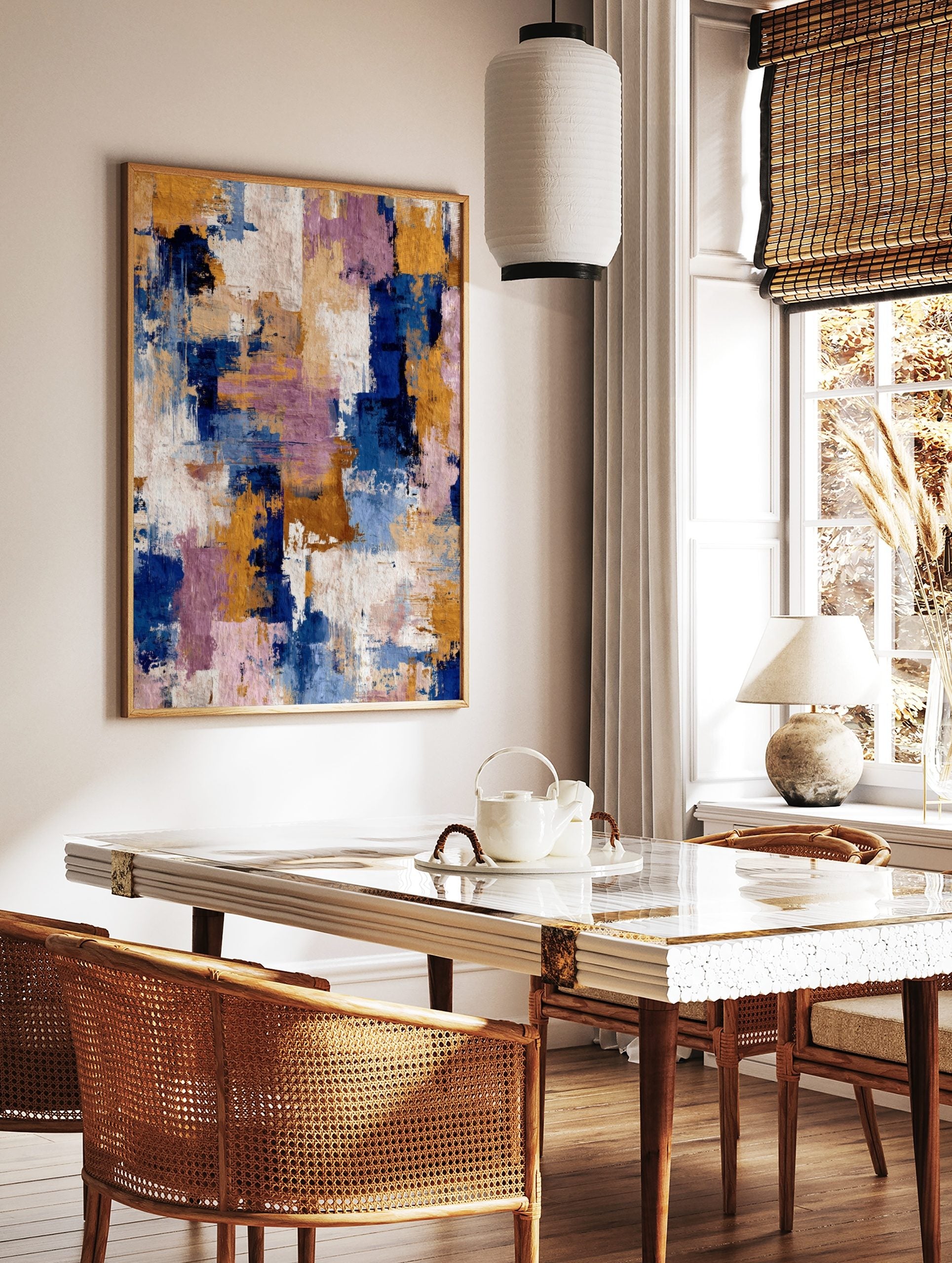 Abstract textured wall art with broad brushstrokes in navy blue, golden yellow, purple, and white, in a styled room mockup