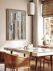Abstract textured wall art with vertical strips in white, beige, brown, and grey tones on a light, in a styled room mockup