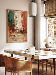 Abstract textured wall art with vertical blocks of deep green, terracotta, and creamy beige colours, in a styled room mockup