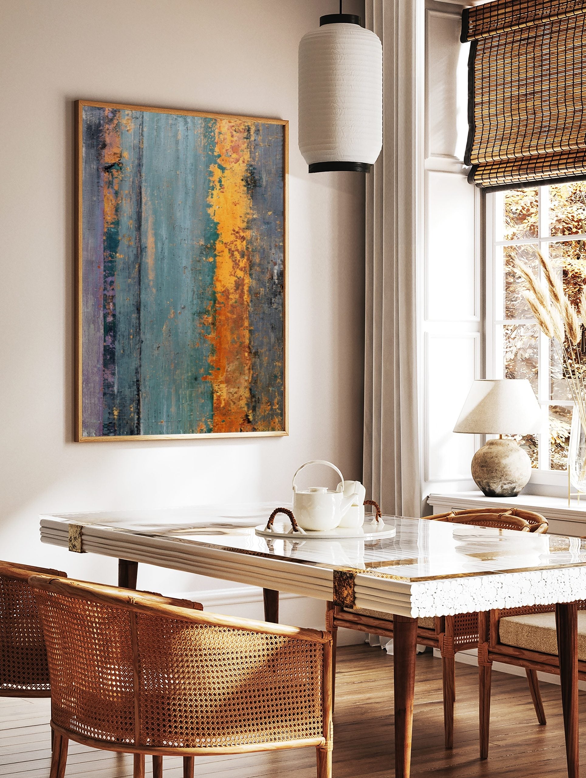 Abstract textured wall art with distressed vertical stripes in teal, orange, grey, and purple, in a styled room mockup