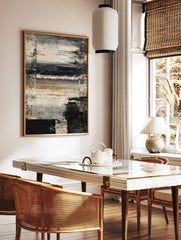 Abstract textured wall art with horizontal black, white, brown brushstrokes and dark vertical edges, in a styled room mockup