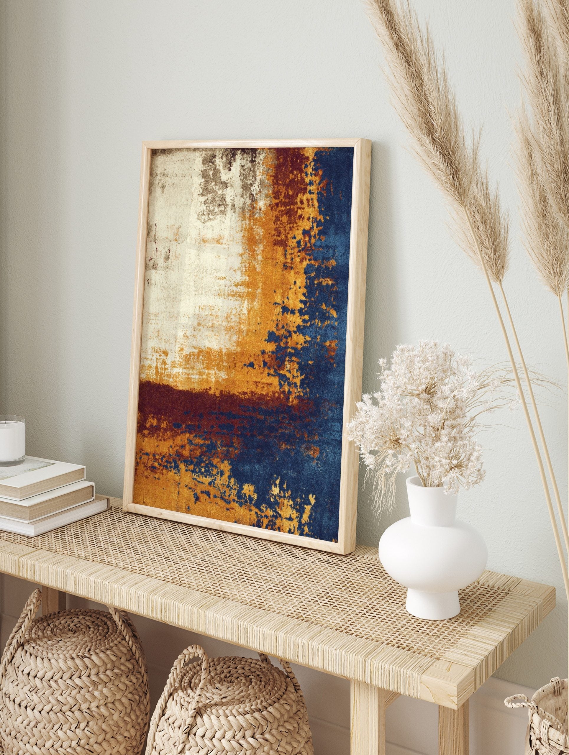 Abstract art print with distressed textures in cream, golden-yellow, deep blue, and burgundy, in an alternate framed mockup