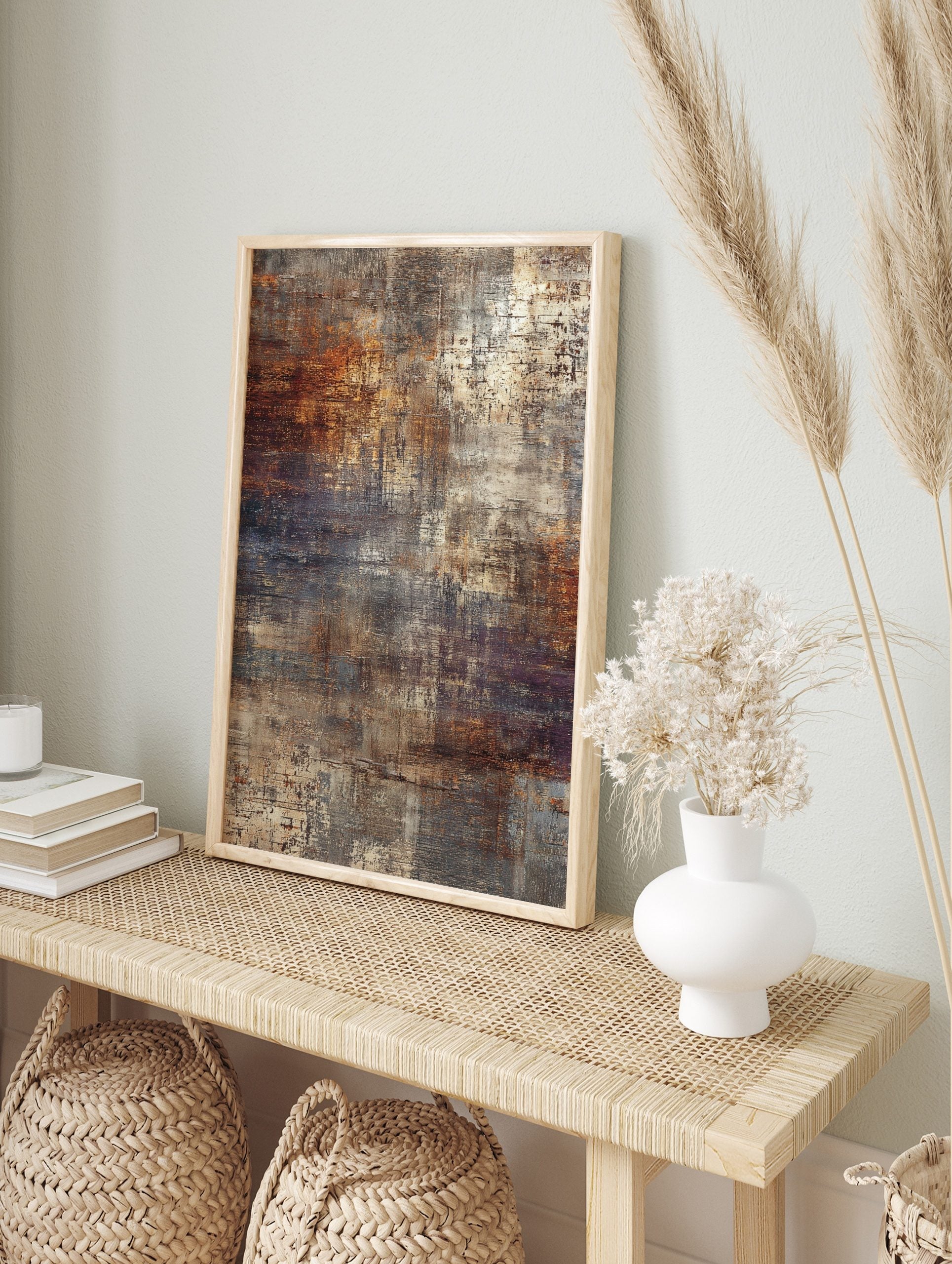 Abstract wall art print with distressed textures in rust orange, brown, grey, and cream, in an alternate framed mockup