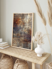 Abstract wall art print with distressed textures in rust orange, brown, grey, and cream, in an alternate framed mockup