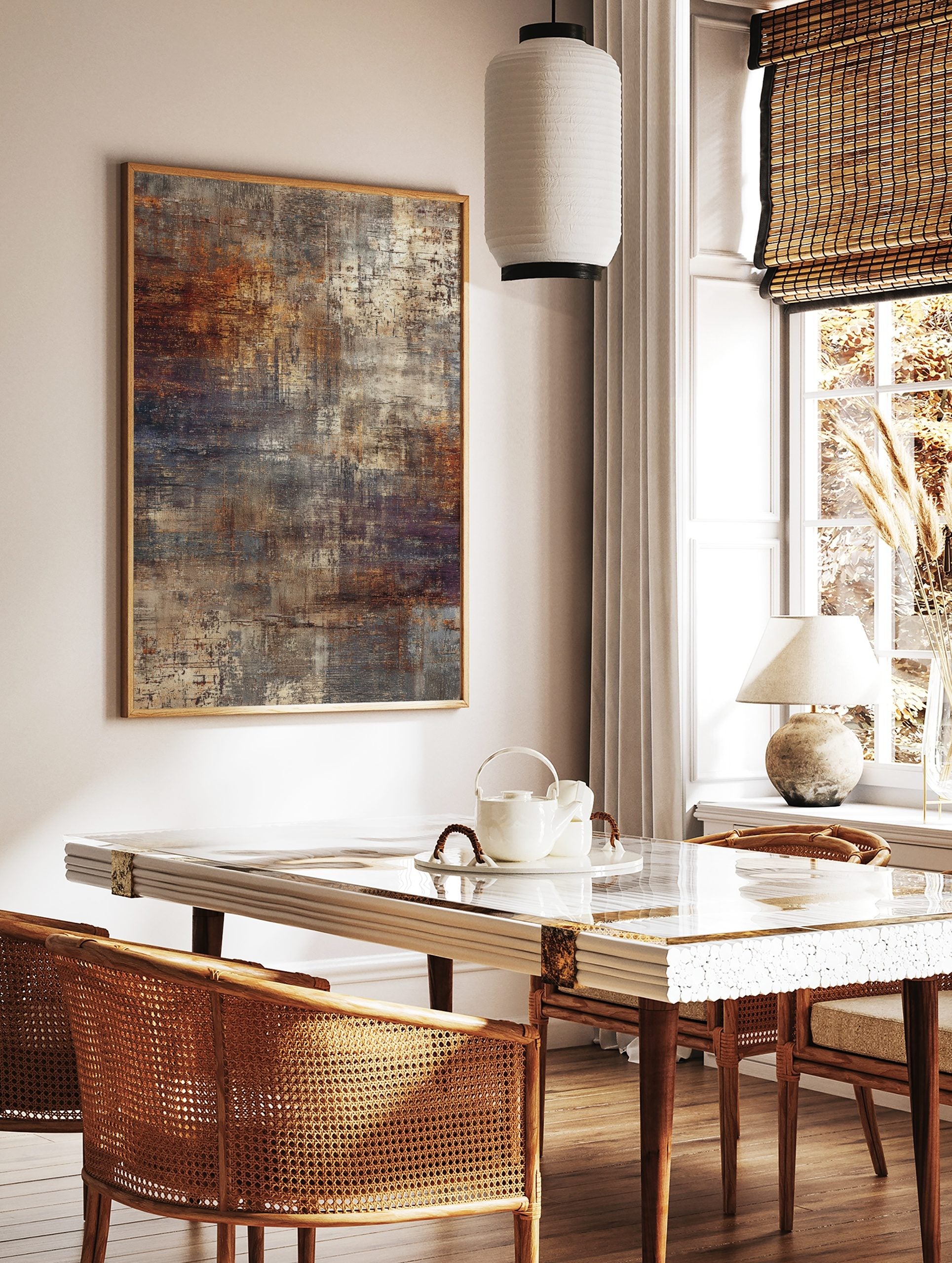 Abstract wall art print with distressed textures in rust orange, brown, grey, and cream colours, in a styled room mockup