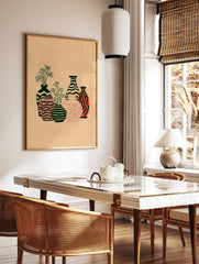Abstract illustrative wall art print of five patterned vases with botanical flowers on a tan, in a styled room mockup