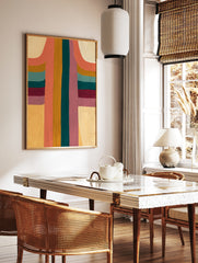Abstract wall art print with vertical bands of coral, ochre, teal, and purple colours and arched, in a styled room mockup