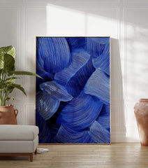 Abstract wall art featuring deep blue textured wavy lines creating a dynamic and fluid pattern on a white background. - Image 3