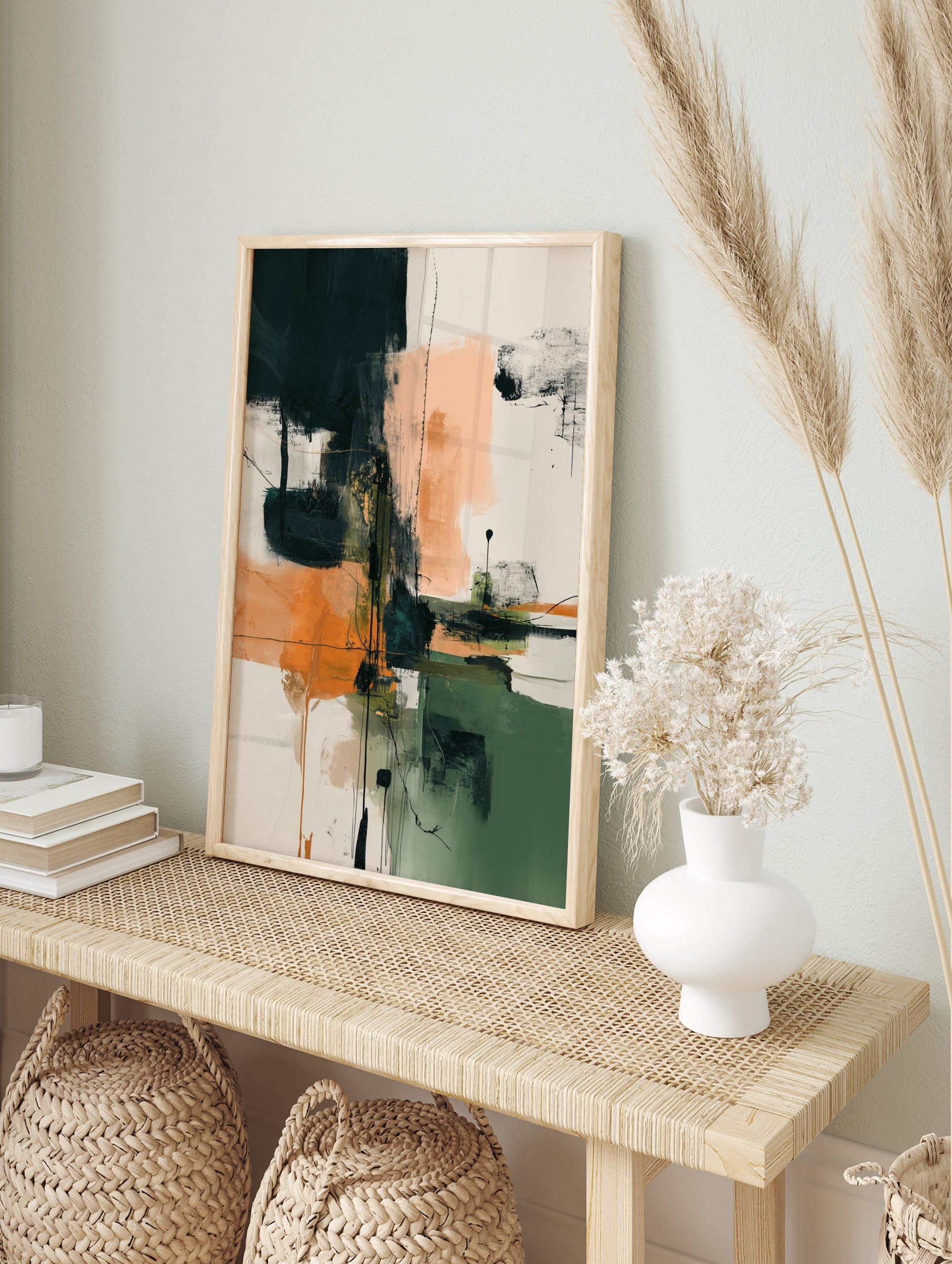 Abstract wall art with dark teal, orange, and off-white colour blocks, dynamic black lines, in an alternate framed mockup