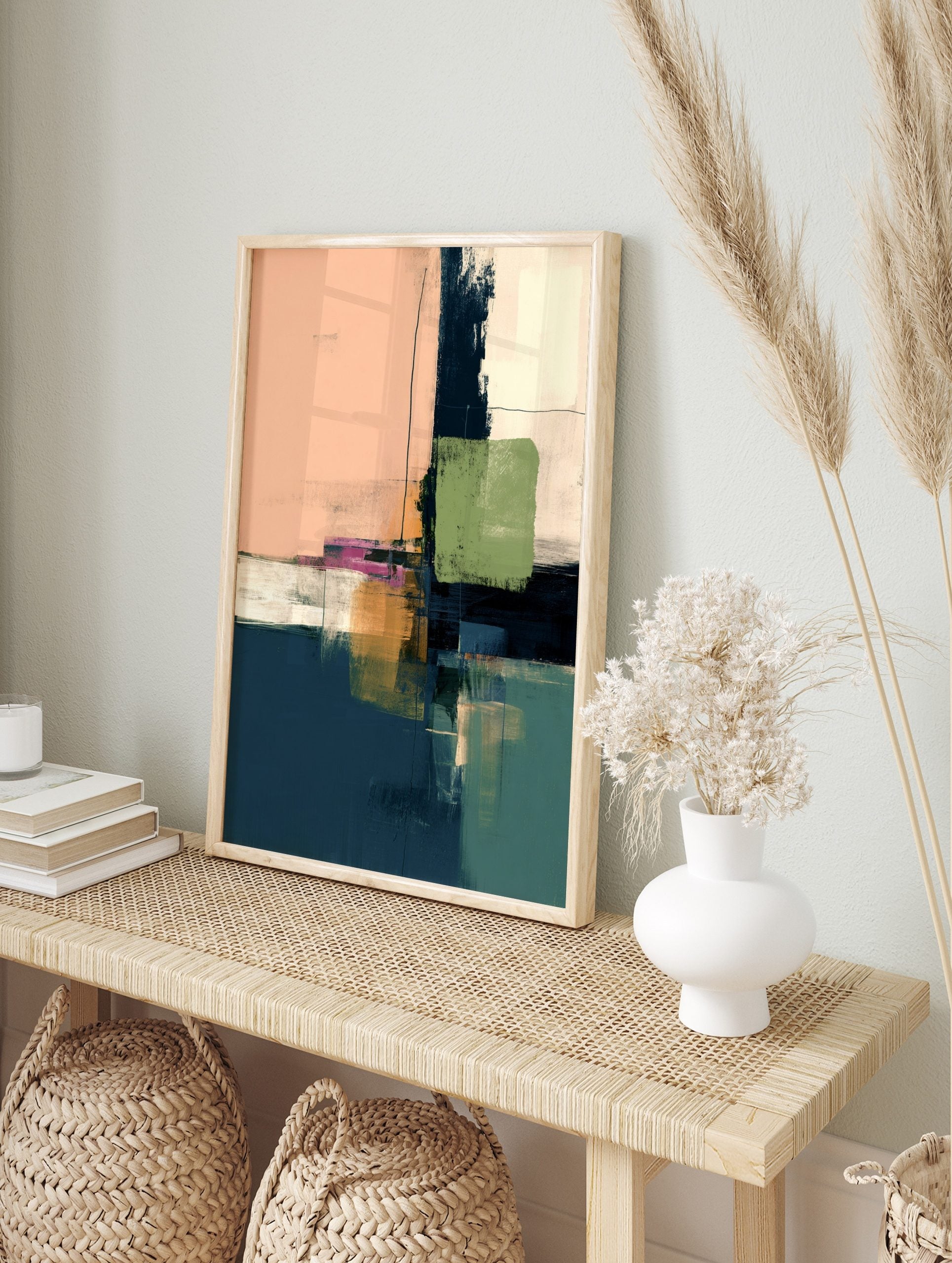 Abstract art print with blocks of peach, navy, green, ochre, and white, featuring thin black, in an alternate framed mockup