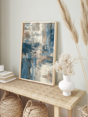 Abstract wall art print with blue, beige, and grey textured brushstrokes and layered, in an alternate framed mockup