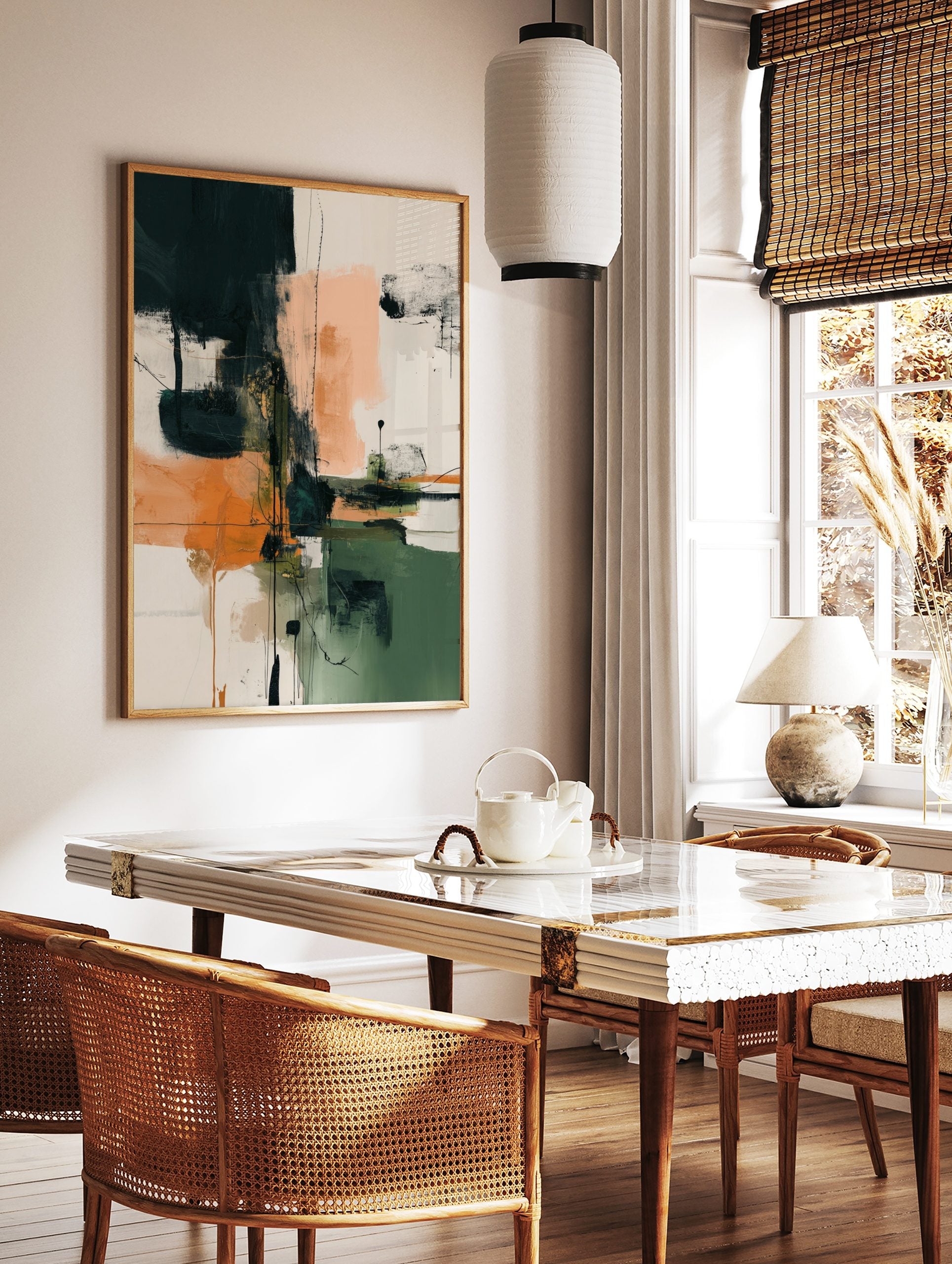 Abstract art print with teal, orange, green, and peach colour blocks, accented by black lines and, in a styled room mockup