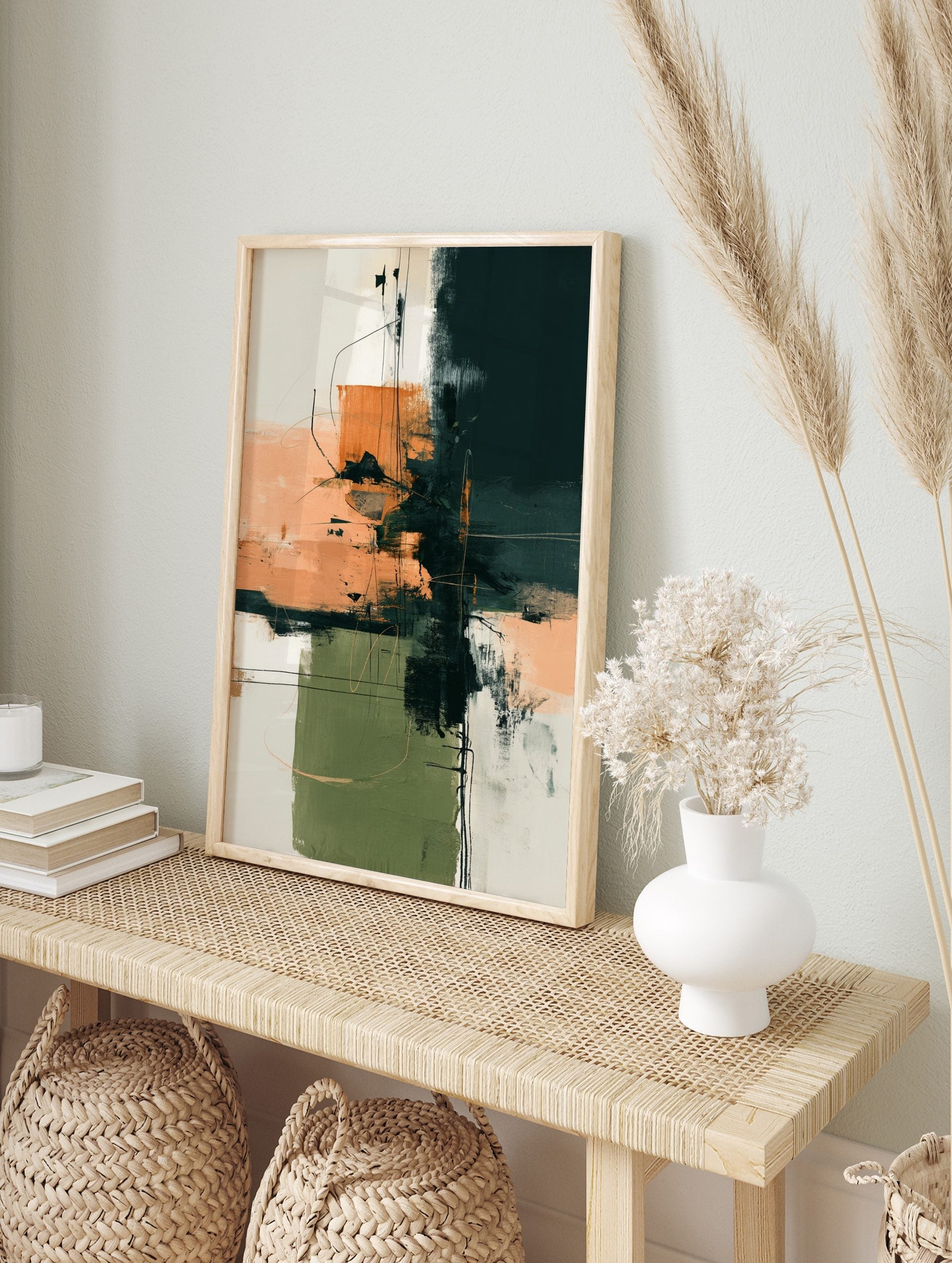 Abstract wall art print with dark teal, peach, and sage green colour blocks and thin black, in an alternate framed mockup