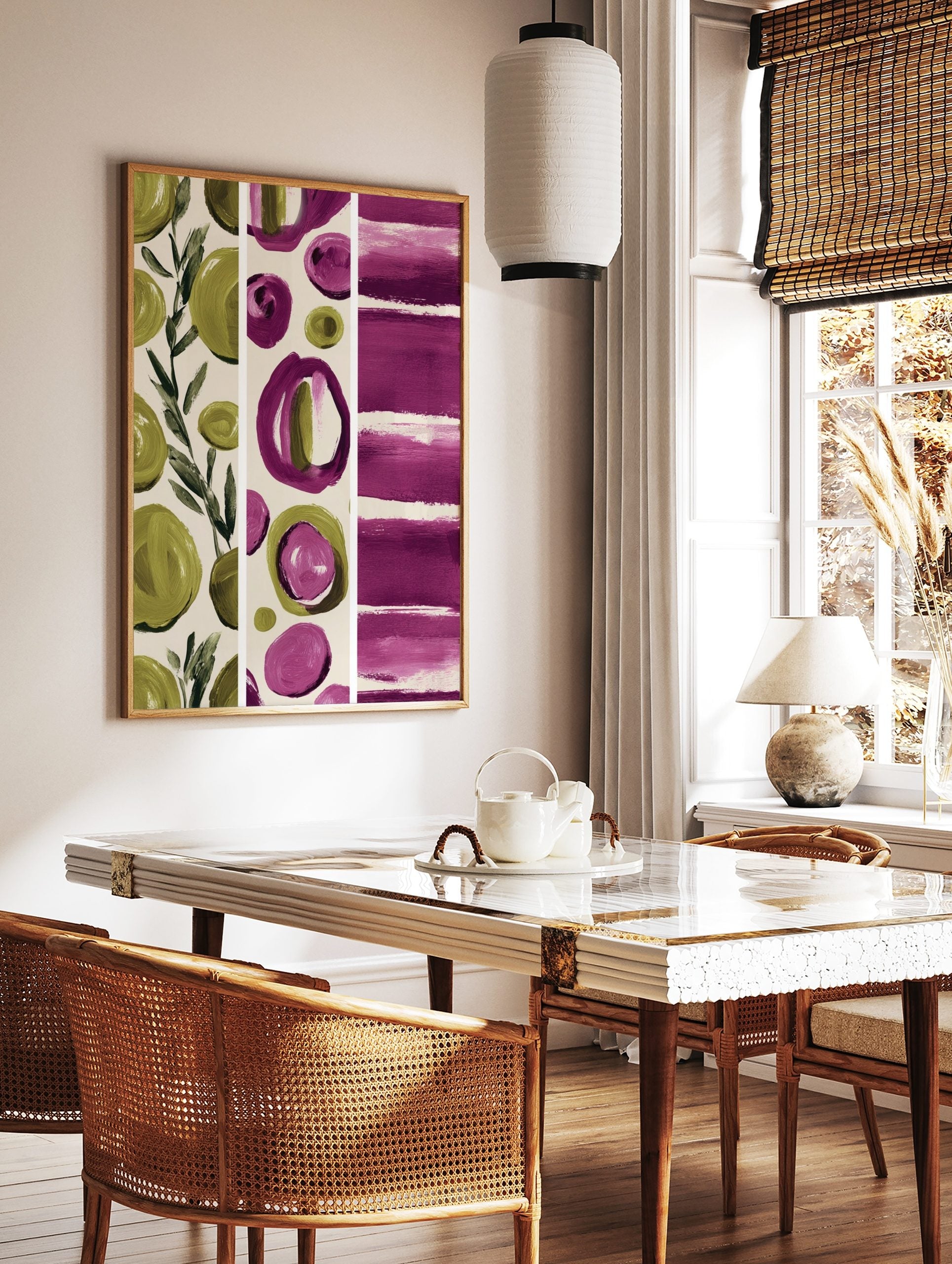 Abstract art print with green leaves, magenta and olive green brushstroke circles, and horizontal, in a styled room mockup