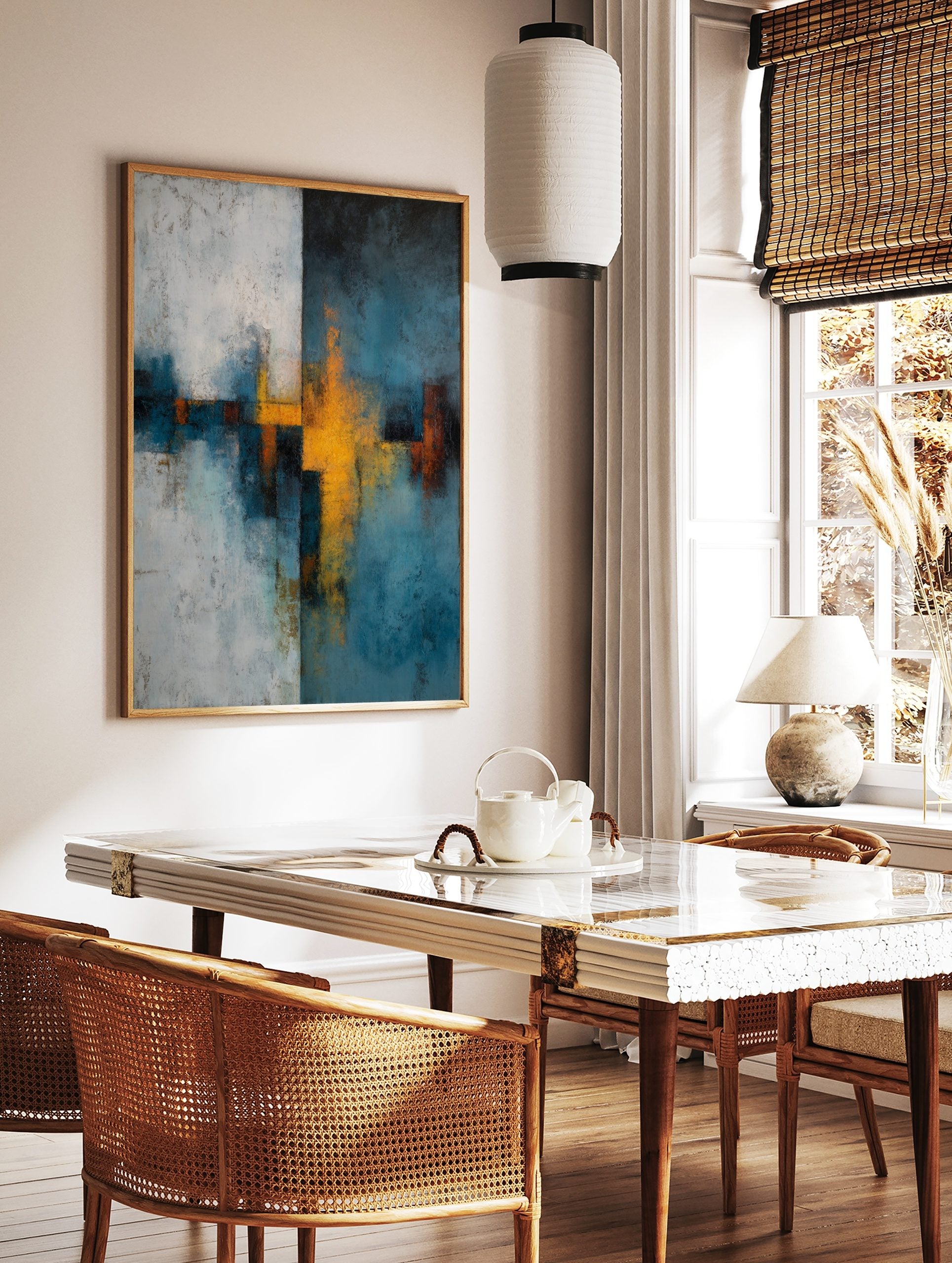 Abstract wall art print with textured blue-teal, yellow, and white intersecting shapes and forms, in a styled room mockup