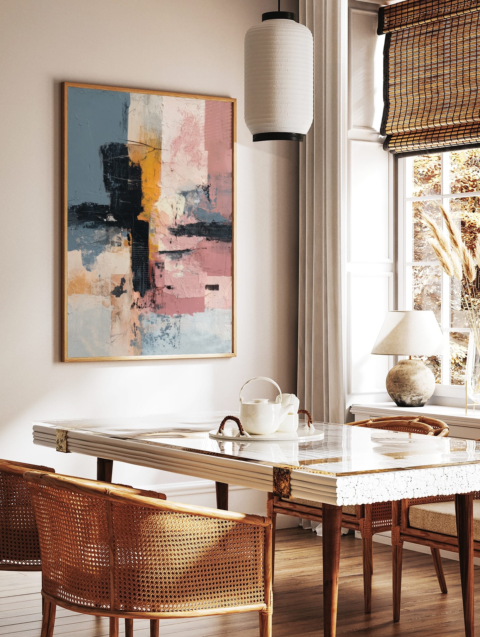 Abstract wall art with textured blocks of muted blue, black, mustard yellow, and pink, featuring, in a styled room mockup