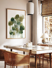 Abstract watercolour art print with green, olive, and brown tree-like shapes and drips on a white, in a styled room mockup