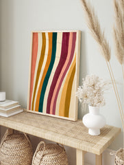 Abstract wavy stripe wall art featuring peach, teal, mustard, and burgundy vertical bands on, in an alternate framed mockup