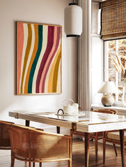 Abstract wavy stripe wall art featuring peach, teal, mustard, and burgundy vertical bands on a, in a styled room mockup