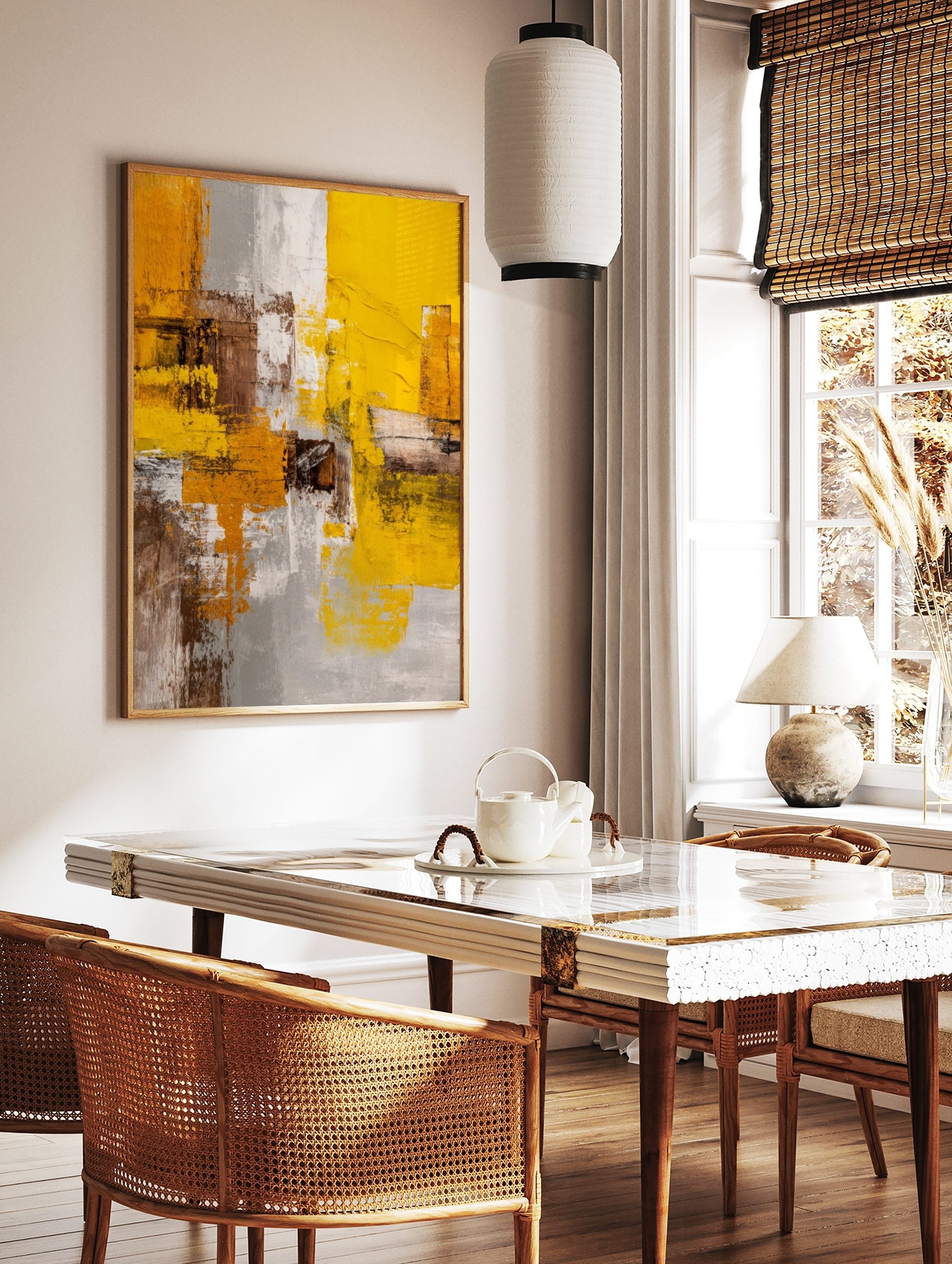 Abstract art print with textured yellow, grey, brown, and white blocks and visible brushstrokes in, in a styled room mockup