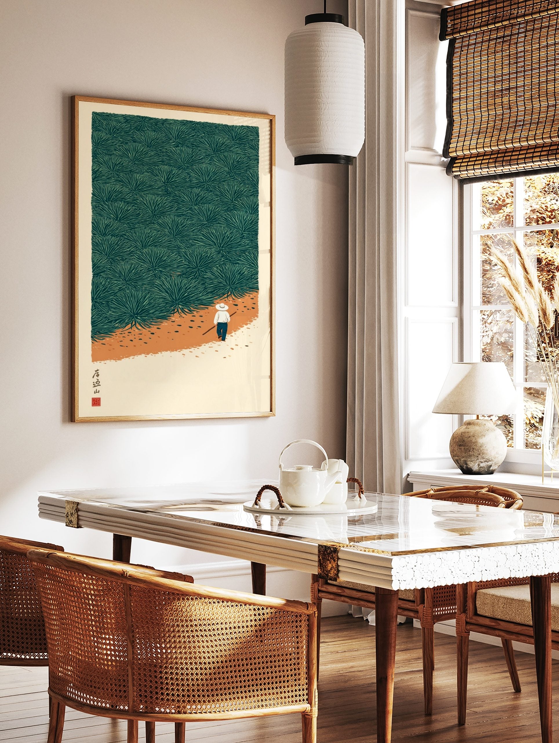 Illustrative print of a person walking on an earthy path through a field of green agave plants, in a styled room mockup